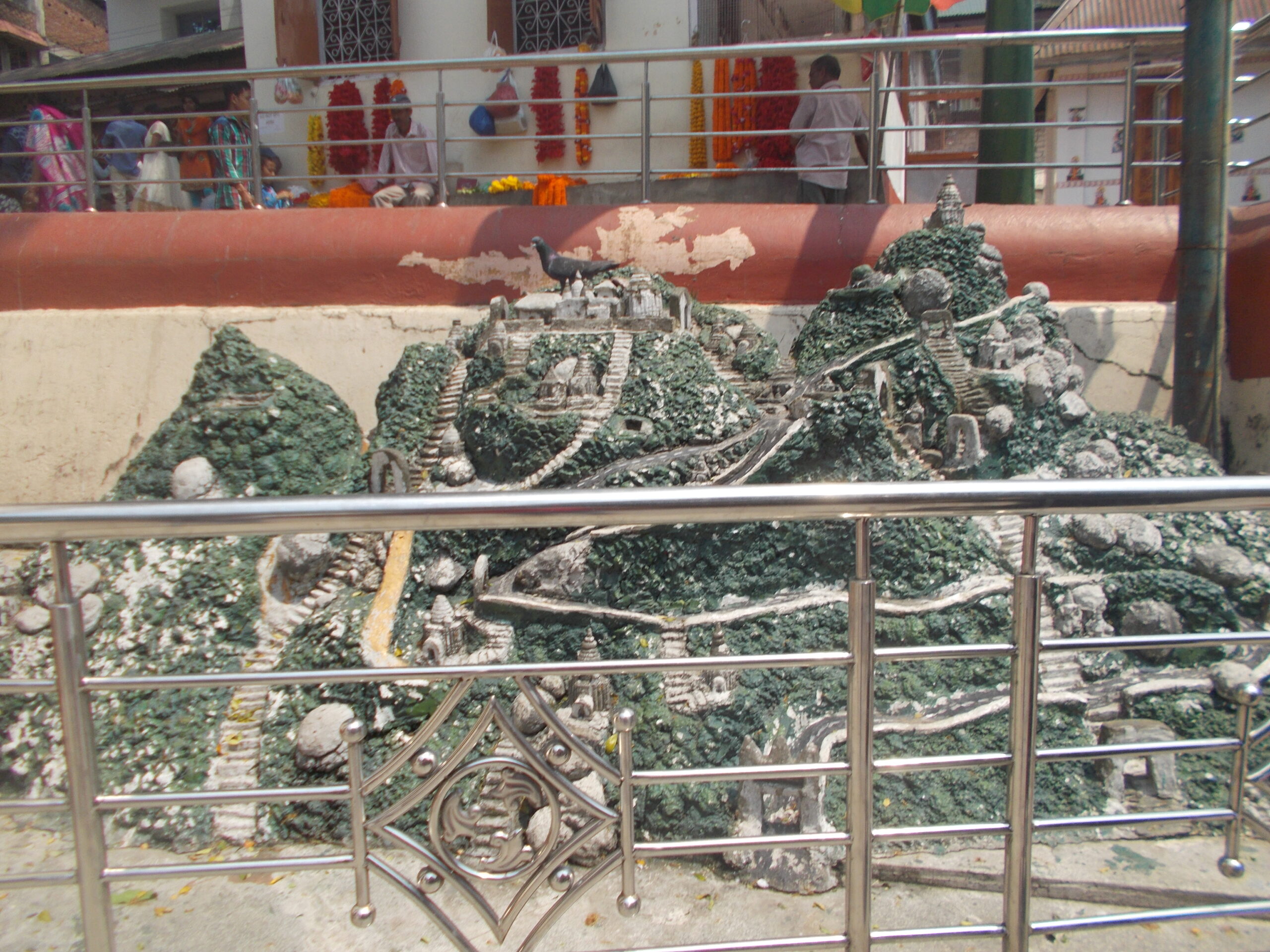 Devotees walking towards the shrine after covering the guwahati to kamakhya temple distance from their hotel near kamakhya temple.