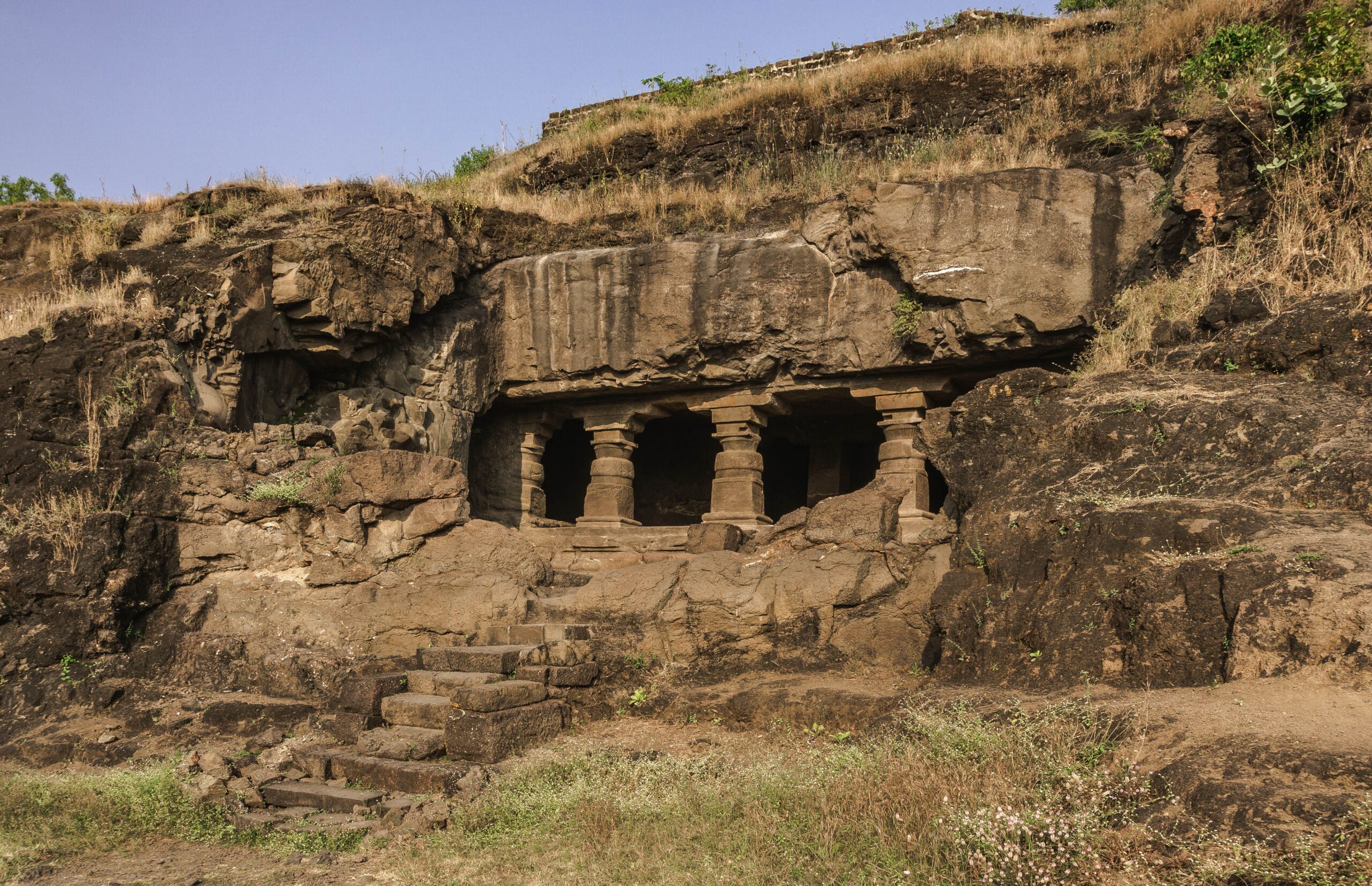 Explore the ancient rock-cut Ellora caves in Maharashtra, showcasing exquisite Indian architecture.
